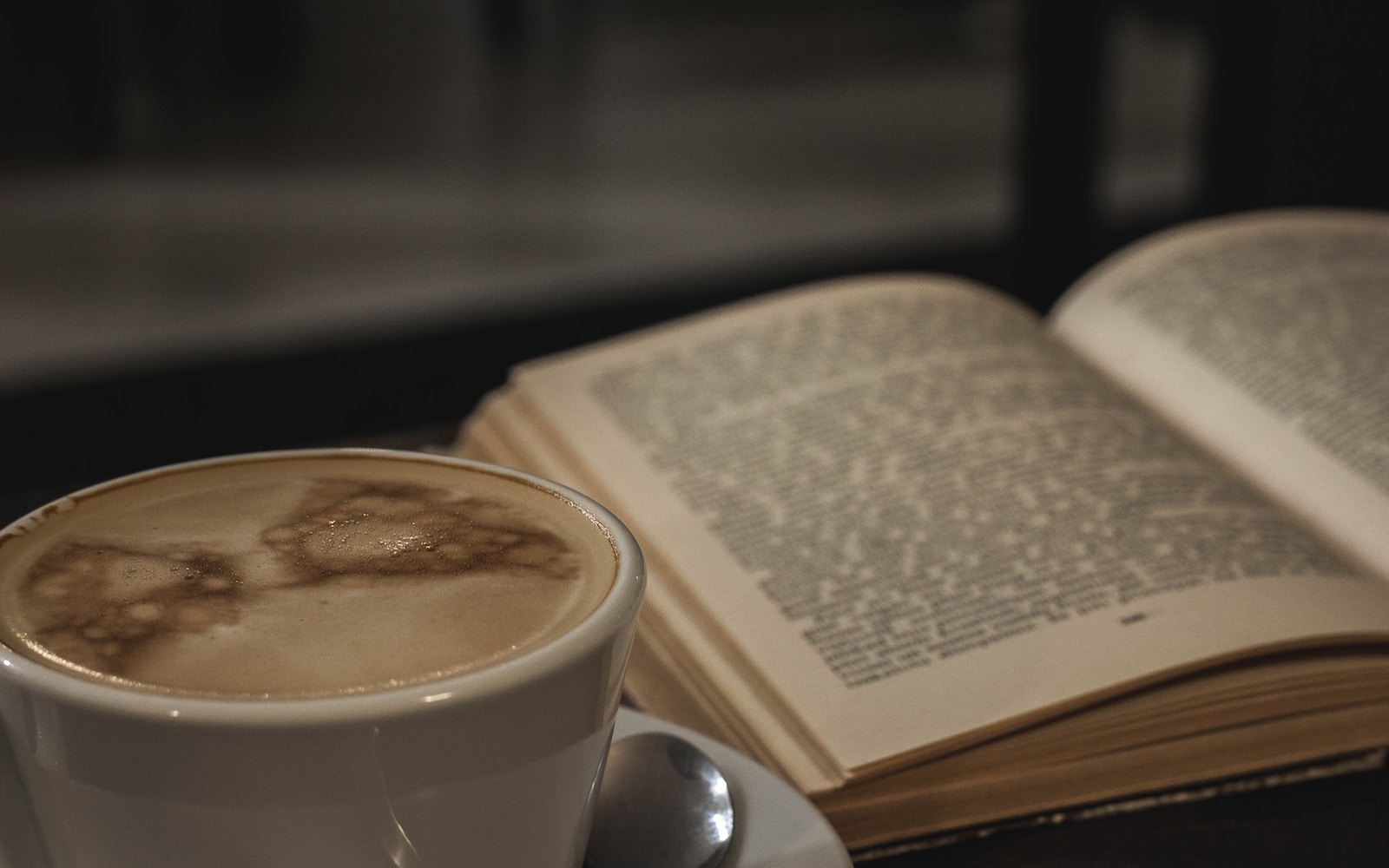 open book and coffee