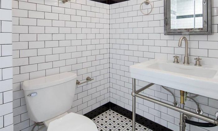 apartment bathroom with subway tile