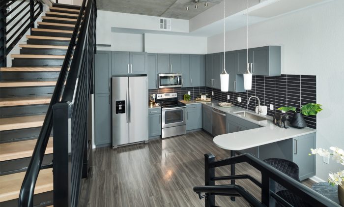 luxury split-level apartment kitchen and staircase