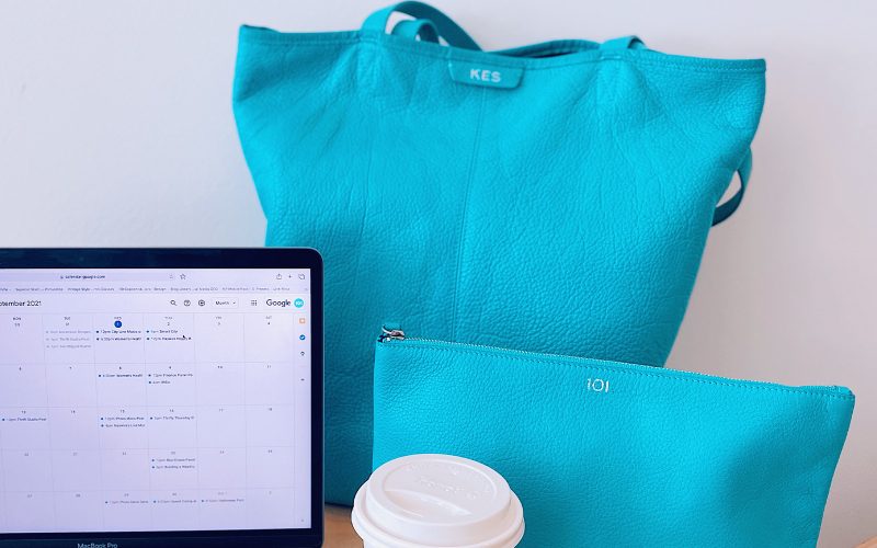 Matching blue tote bag and zip pouch from LEatherology