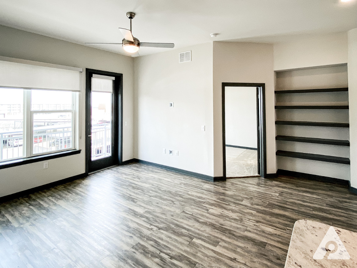 Fort Worth Apartment - Living Room with Balcony access