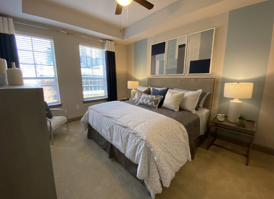 Buckhead apartment with carpeted floors in the bedroom.