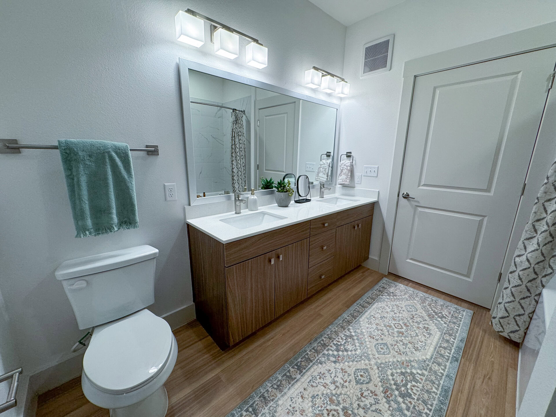 apartment bathroom with double sinks