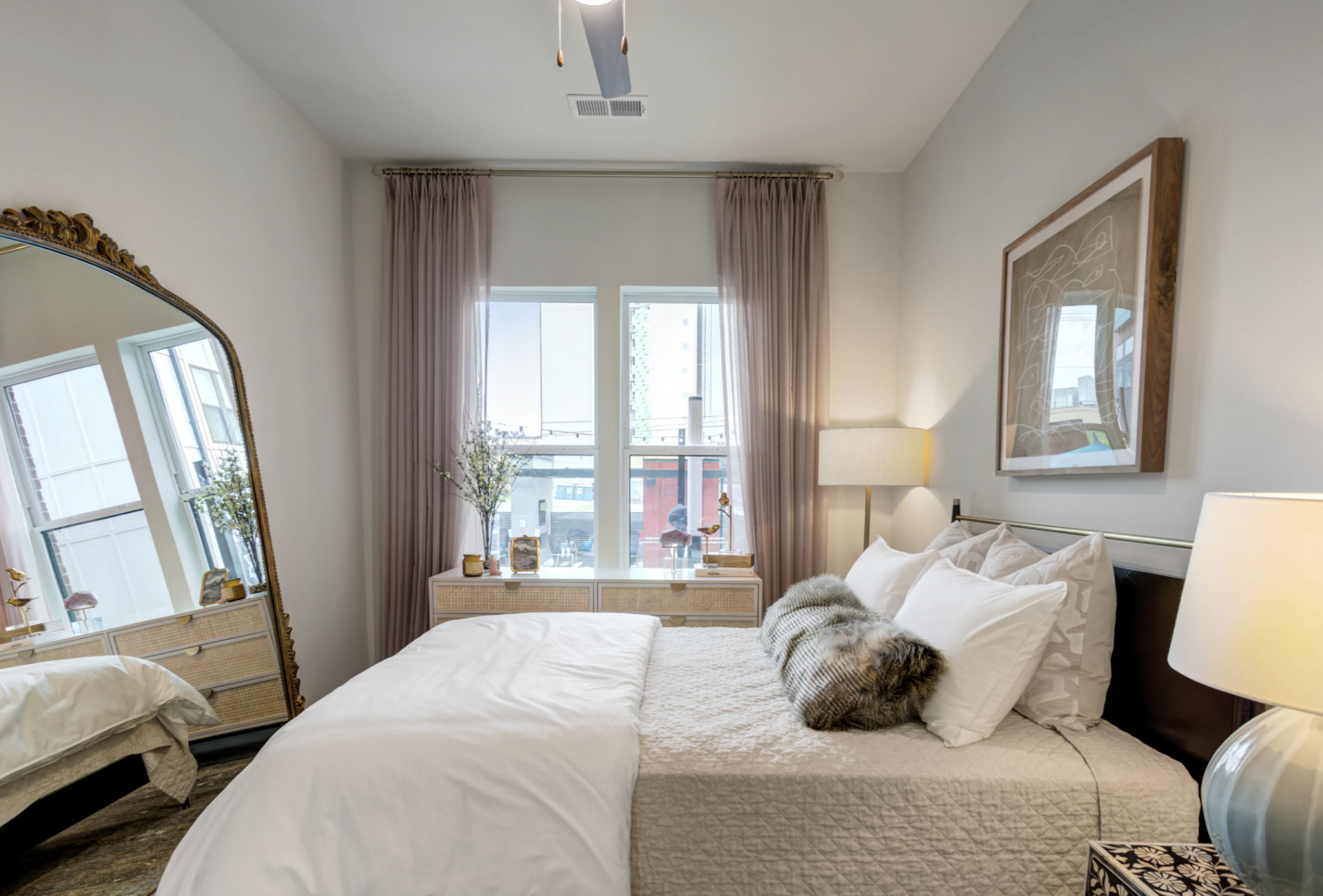 Nashville Midtown apartment bedroom with 10 ft ceilings.