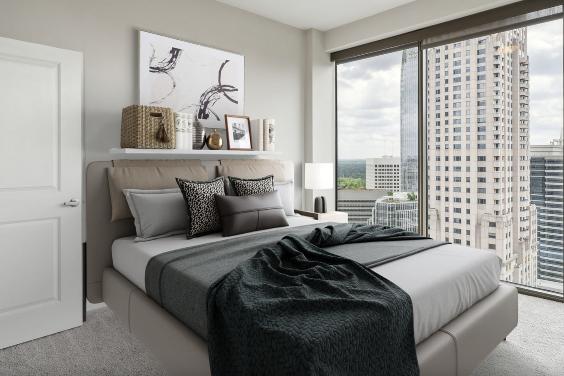 Midtown Atlanta apartment bedroom with floor to ceiling windows.