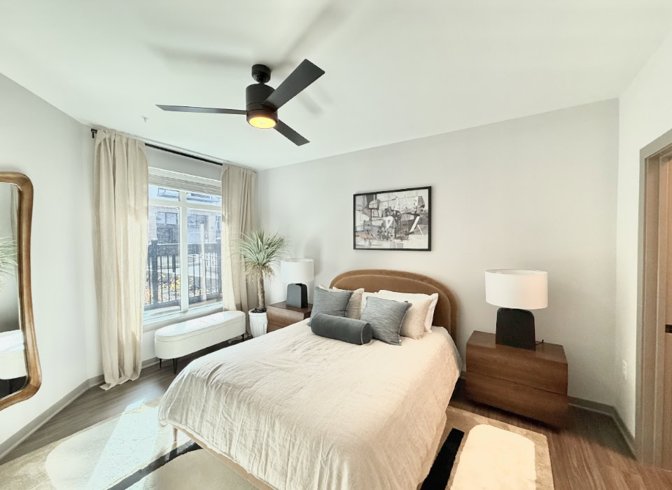 Downtown Nashville apartment bedroom with big windows and tons of space.