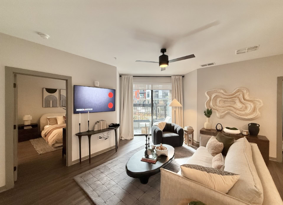 Downtown Nashville apartment living room with attached balcony.