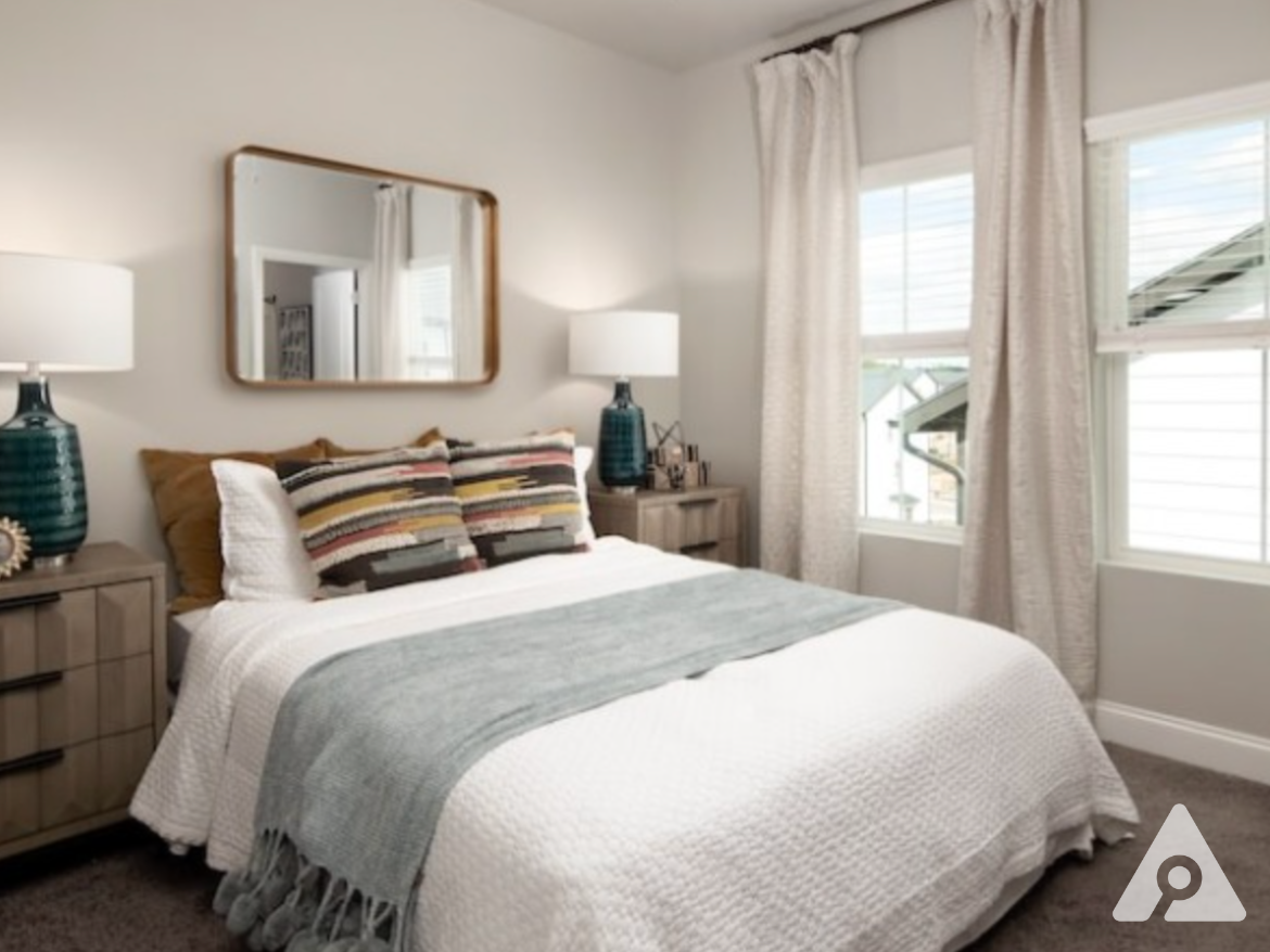 Atlanta townhomes bedroom with a large window.