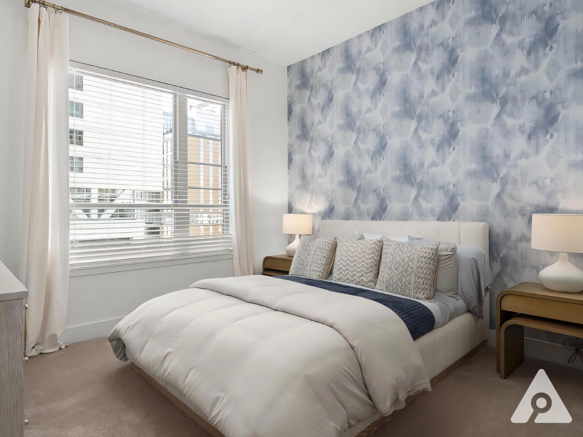 Midtown Atlanta apartment bedroom with tons of natural light.