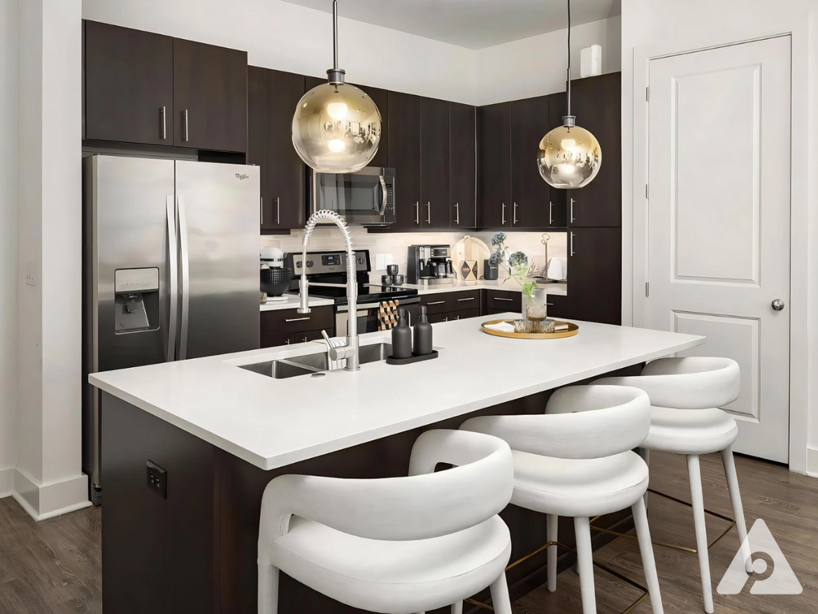 Midtown Atlanta apartment kitchen with dark brown cabinetry.