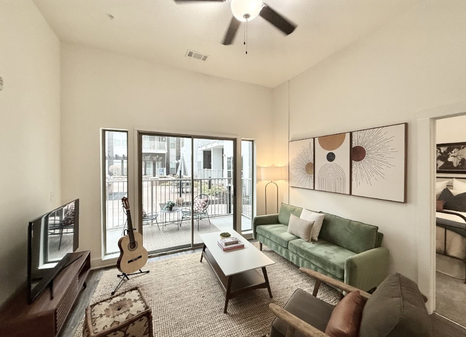 East Nashville apartment living room with an attached balcony.