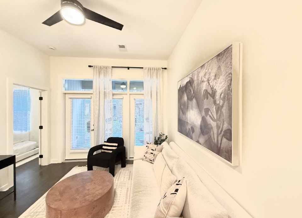 Germantown apartment living room with an attached patio and tons of natural light.