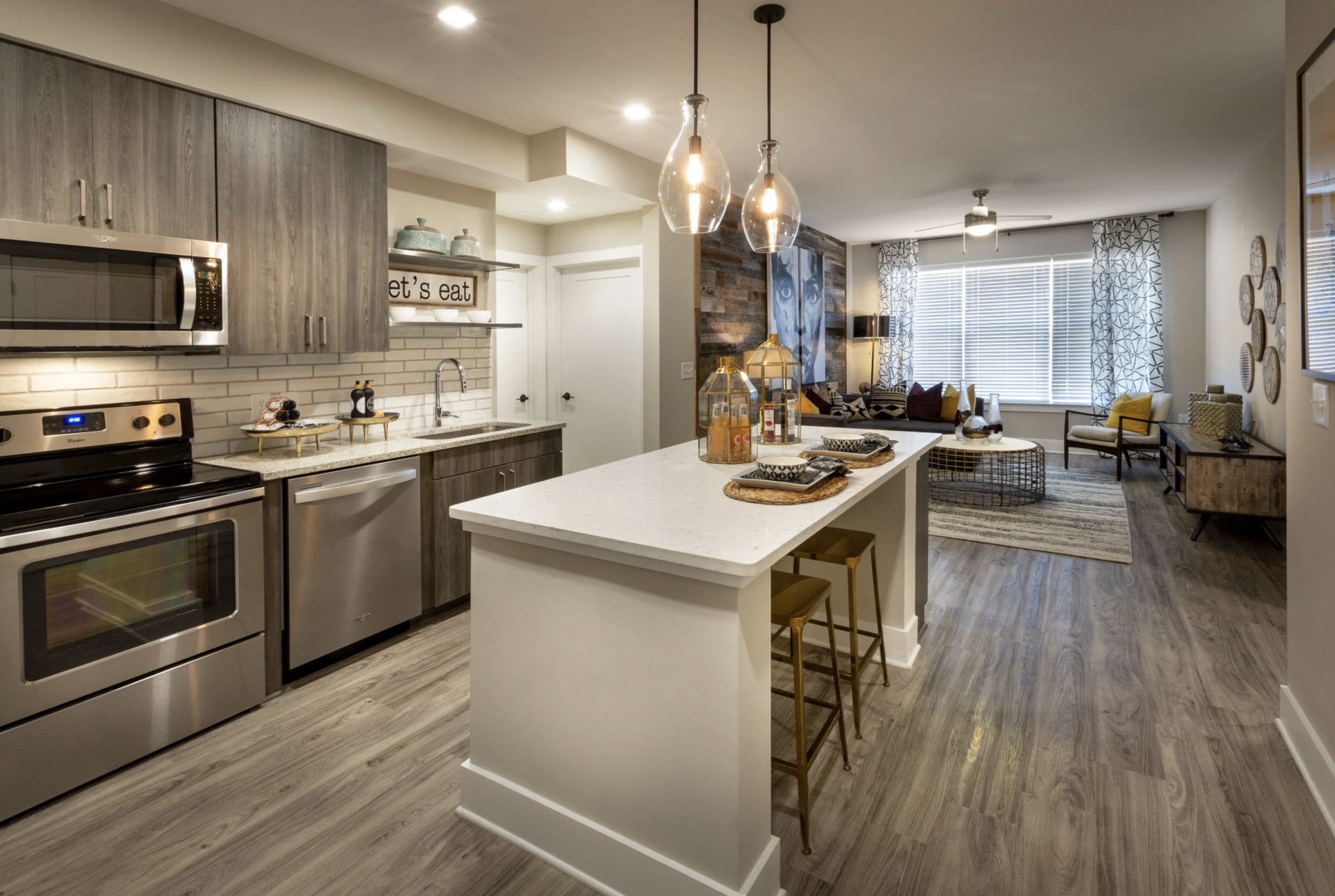 Grant Park apartment kitchen with wooden cabinetry and a large island.