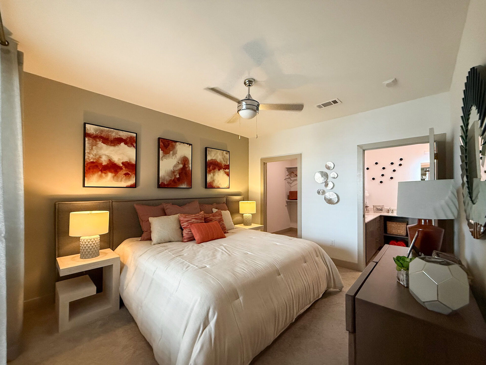A cozy primary bedroom features a large bed.