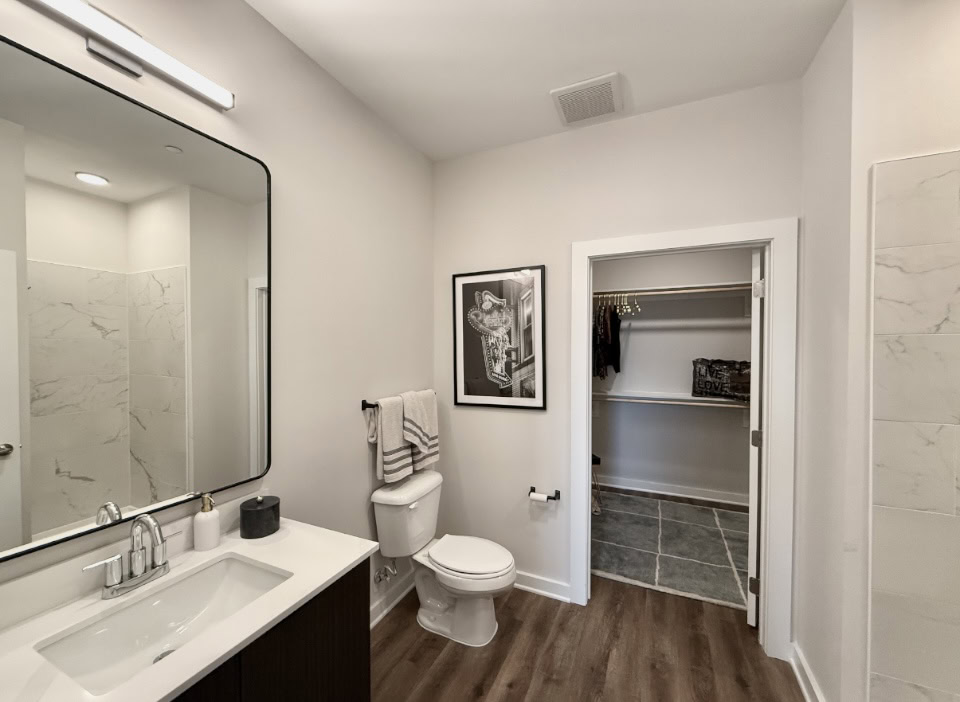 Downtown Nashville Apartments bathroom with a walk in shower.