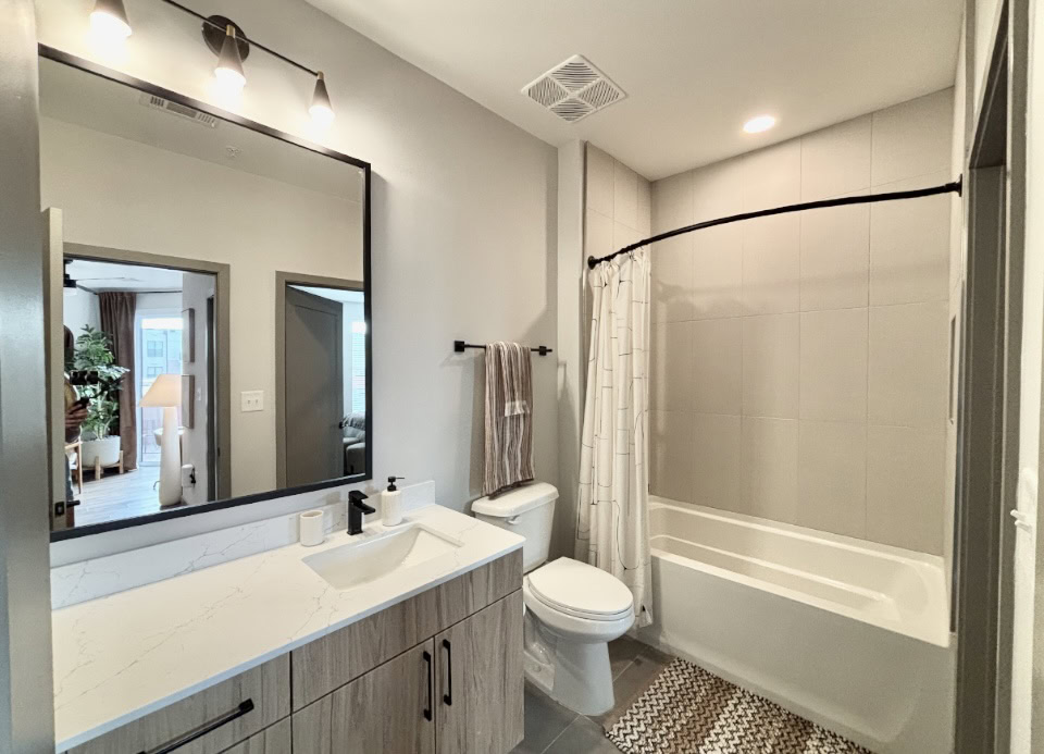 Apartments in Germantown, bathroom with a good amount of counter space and a bath tub.