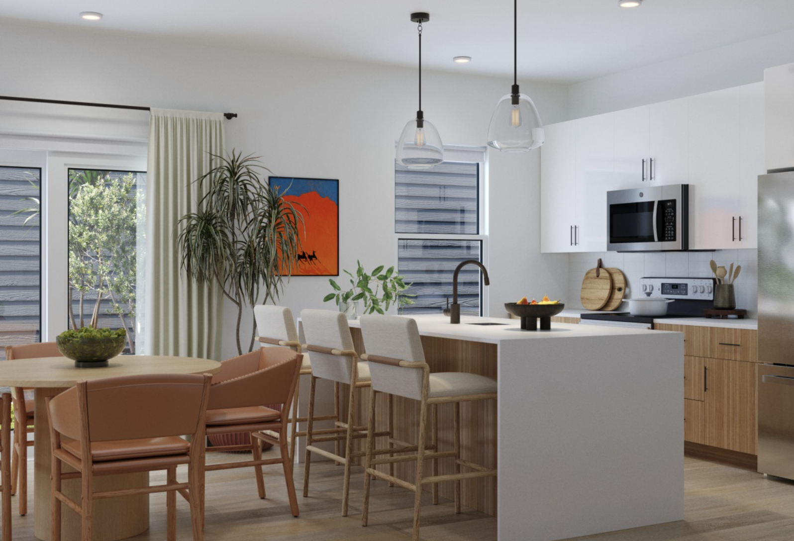 Fort Worth Townhomes kitchen with white cabinets and a massive island.