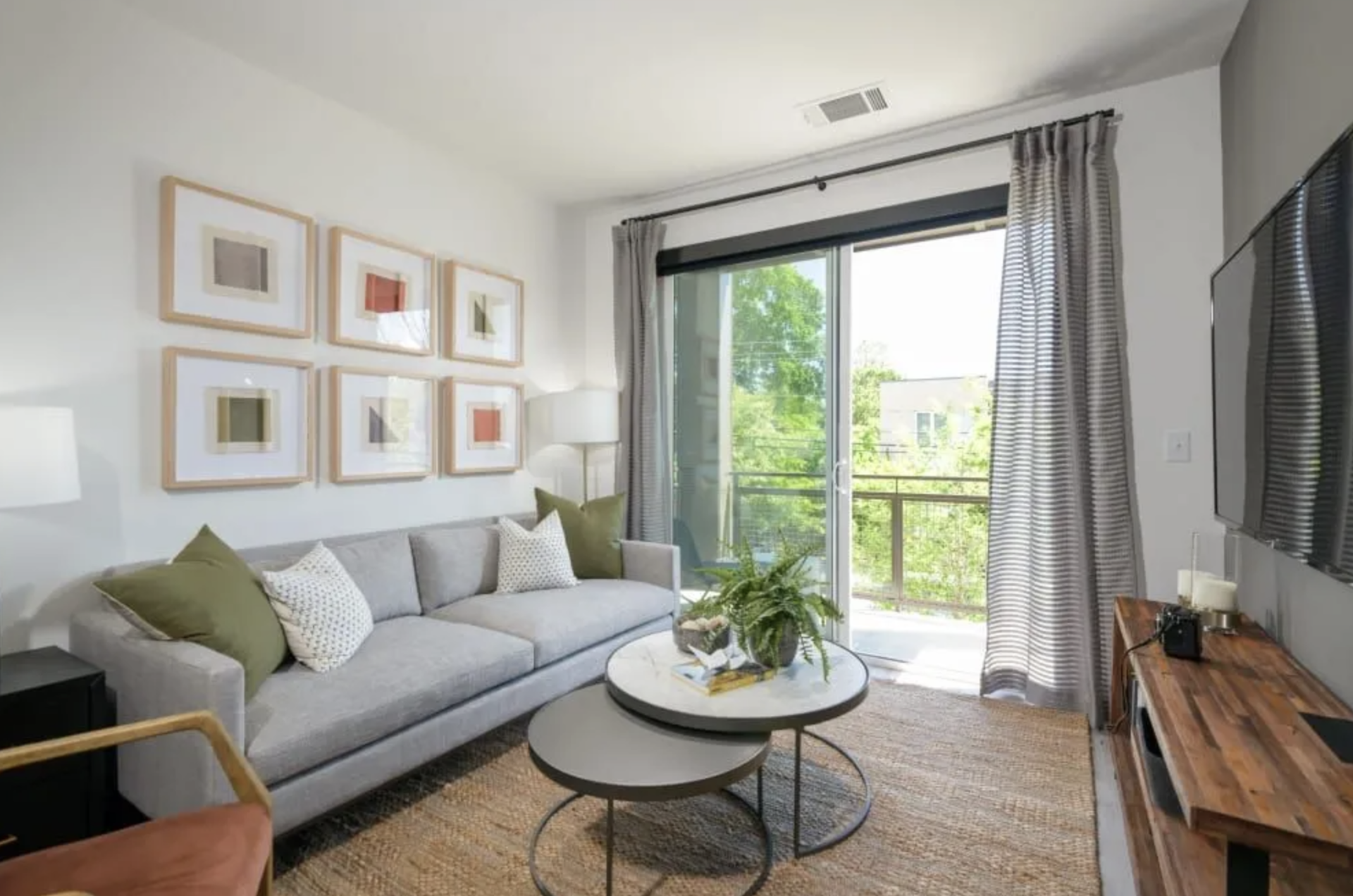 Atlanta Apartment living room with tons of natural light and a balcony.