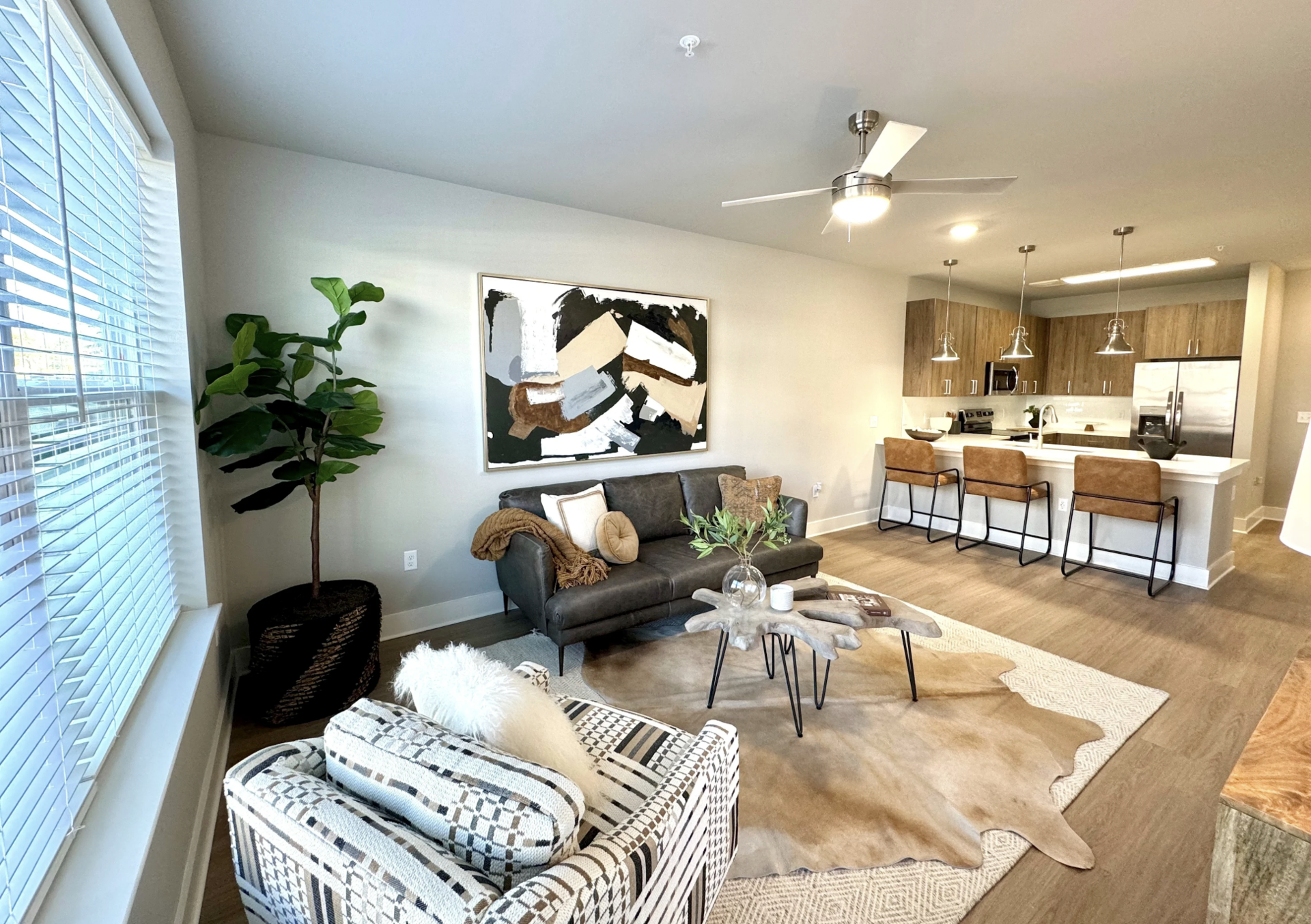 Atlanta Apartment living room with hardwood floors and tons of natural light coming in.