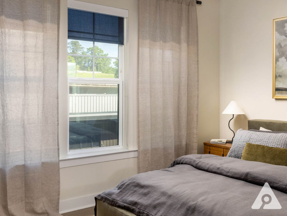 Atlanta Apartment bedroom with a large window.