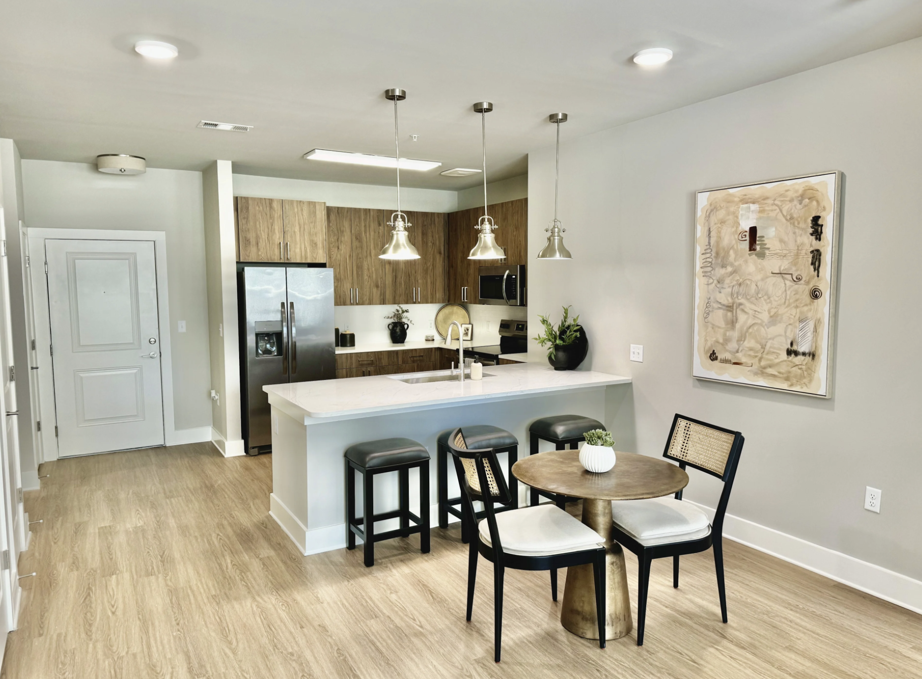 Atlanta Apartment kitchen with wood cabinets, stainless steel appliances, and tons of space.