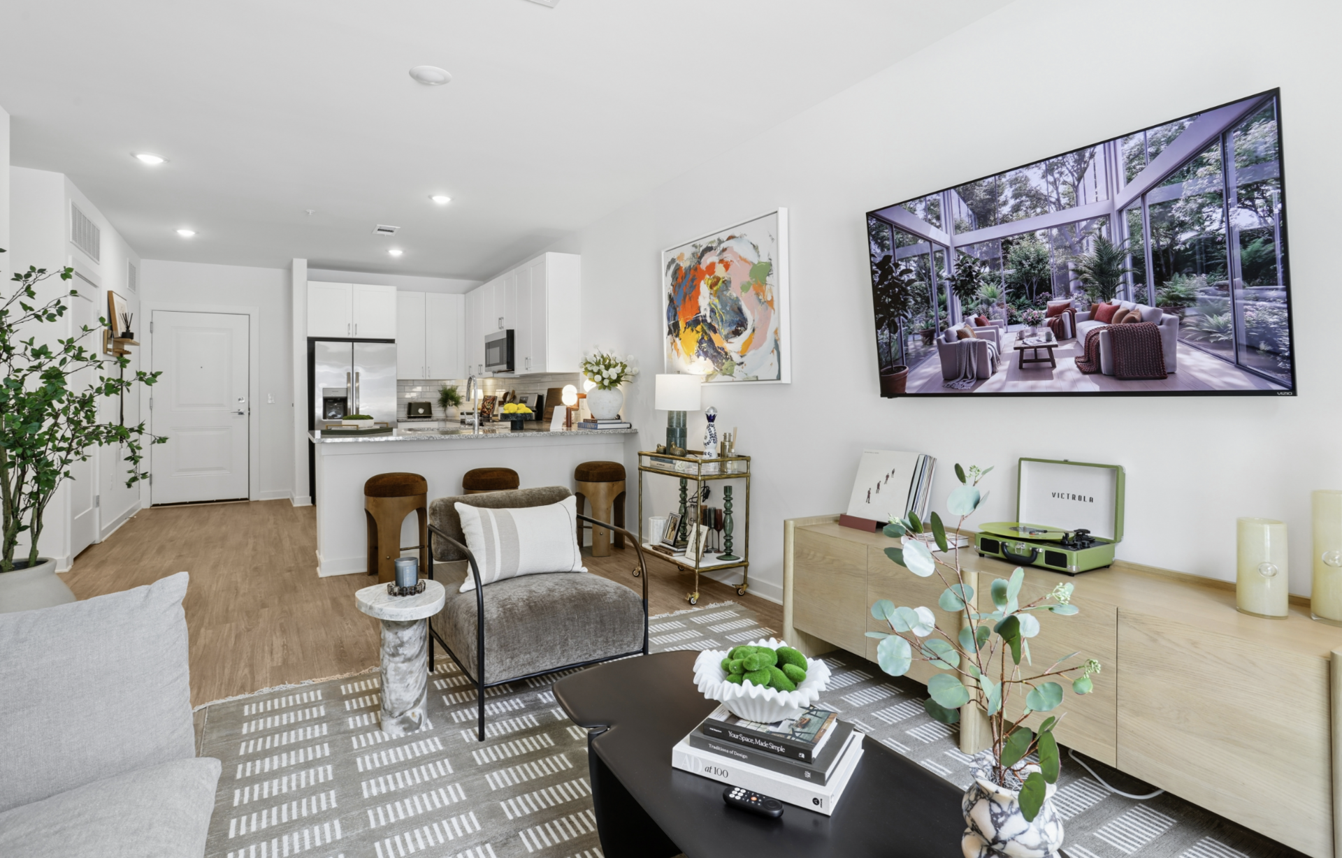Atlanta Apartment living space with wood flooring and great natural light.
