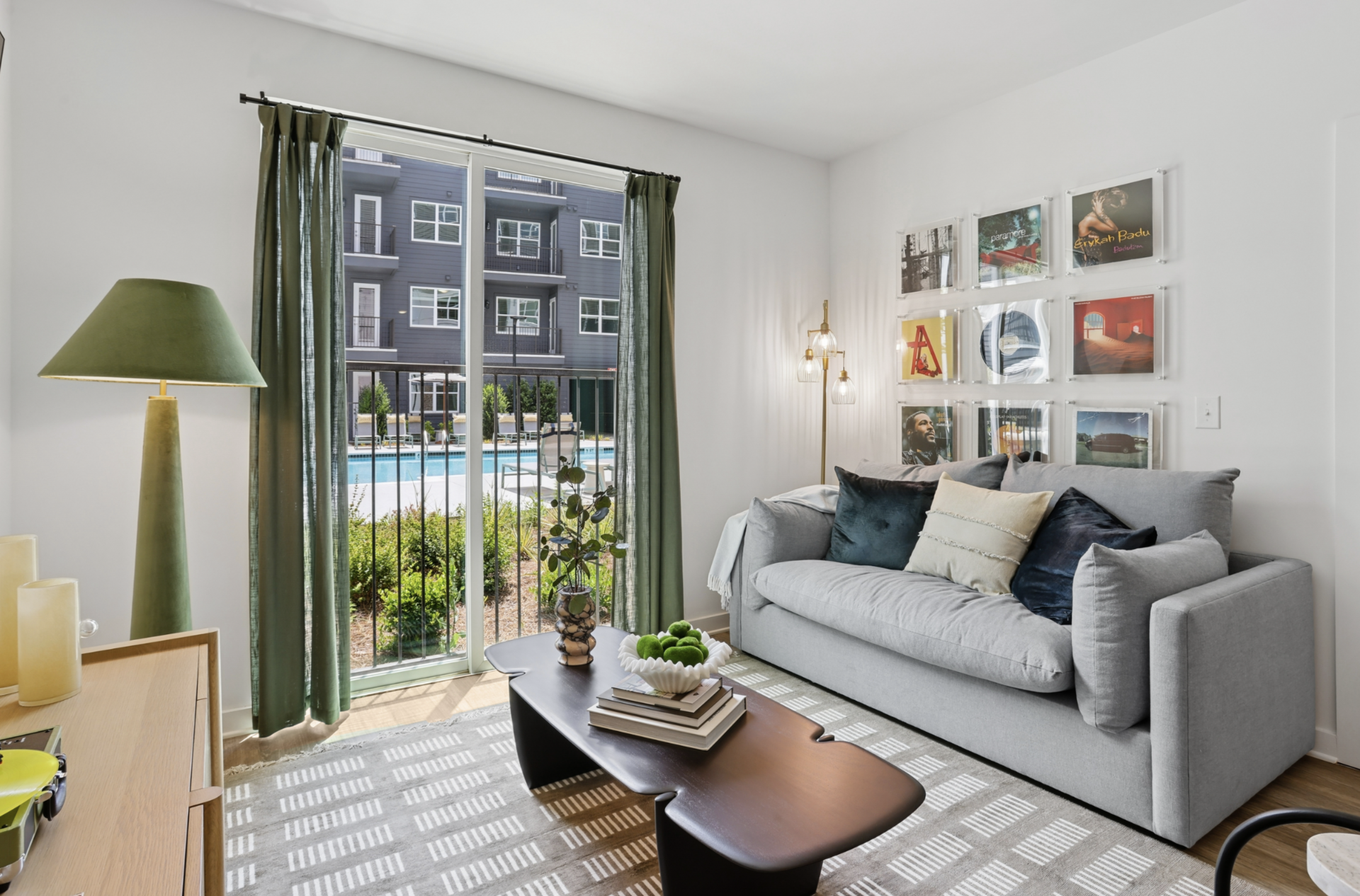 Atlanta Apartment living room with large windows bringing in tons of natural light.