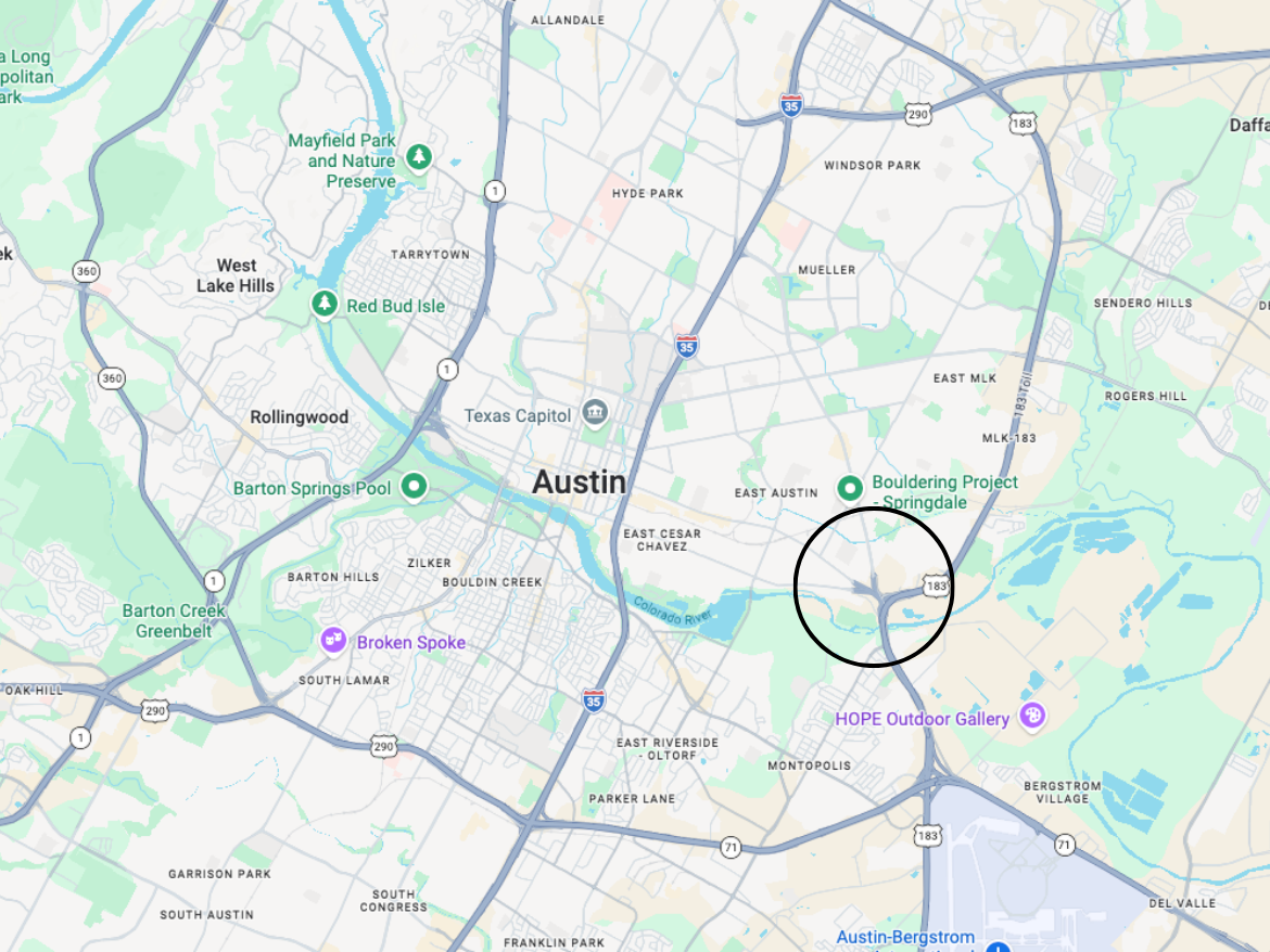 A detailed map of Austin, Texas, highlighting various neighborhoods and landmarks. Key features include major roads such as I-35, US-290, and US-183, along with notable locations like the Texas Capitol, Barton Springs Pool, and the Bouldering Project in Springdale. The map also shows parks and green spaces, including Mayfield Park and the Barton Creek Greenbelt. A circular area is marked, indicating a specific location of interest.