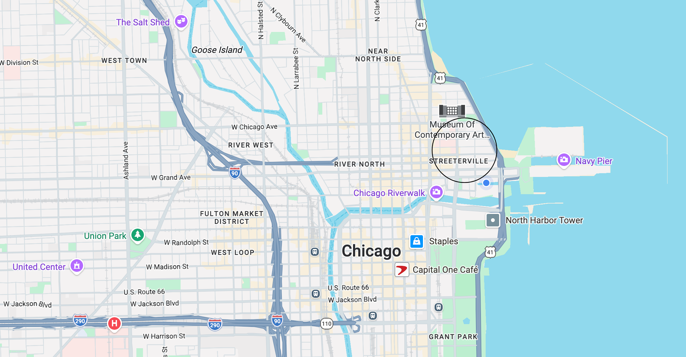 A detailed map of Chicago, highlighting various neighborhoods and landmarks. Key areas include River North, River West, and the Fulton Market District. Notable locations marked are the Museum of Contemporary Art, Navy Pier, and Grant Park. Major roads and highways, such as U.S. Route 66 and I-90, are also visible, along with the Chicago River and its surrounding areas.